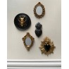 Décoration murale ex voto coeur noir mat patiné doré
